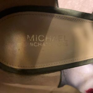 I am selling a pair of Michael Kors heels.Size 7.5